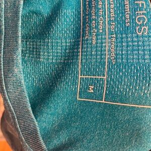 FIGS Extreme Blue Seamless Scrub Top